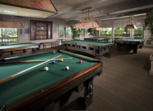 two pool tables in a clubhouse game room