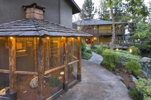 a bird aviary with lights at dusk at The Aspens Riverside, Riverside, 92504