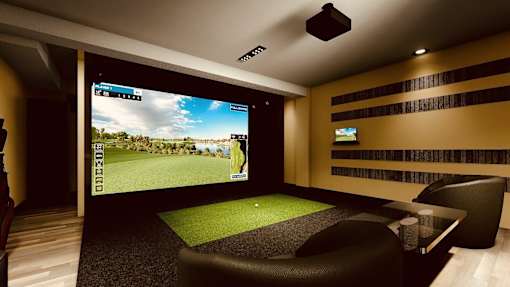 A modern home theater with a large screen and comfortable seating.