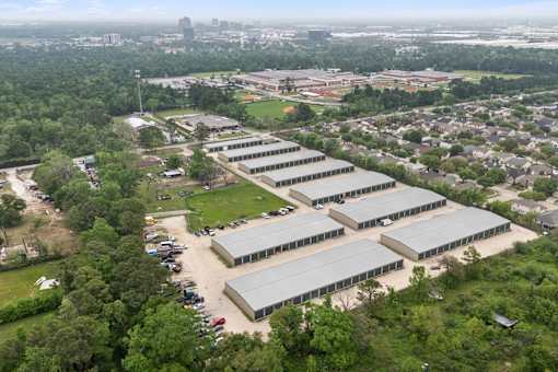 An aerial view of the Houston Premium Storage facility showing multiple buildings and surrounding area.