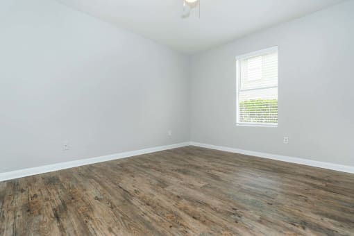 Bedroom with windowat Royal Wildewood Manor Apartments, Texas, 77531