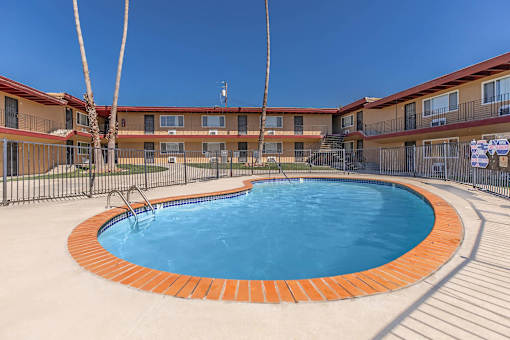 a resort style pool is in the middle of a building