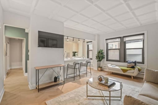 a living room with a couch and a table