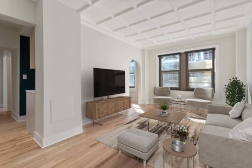 a living room with a couch and a tv