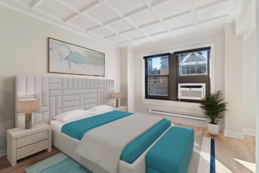 a bedroom with a bed and a window