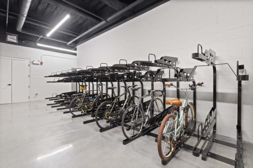 the new bike racks in the new building are filled with bikes
