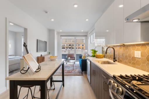 a kitchen with a counter top and a sink