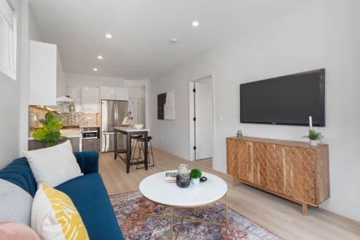 a living room with a couch and a table