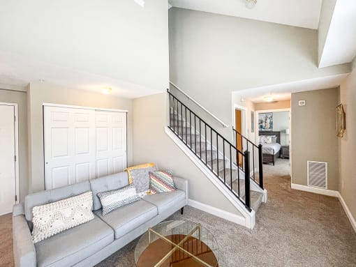 View from great room towards stairway to second floor loft and 1st floor bedroom