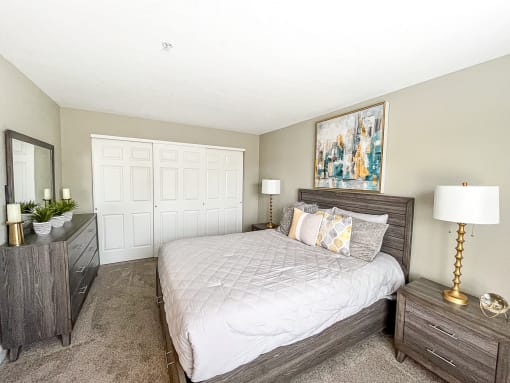 Spacious 1st-floor bedroom with large closet and plush carpeting