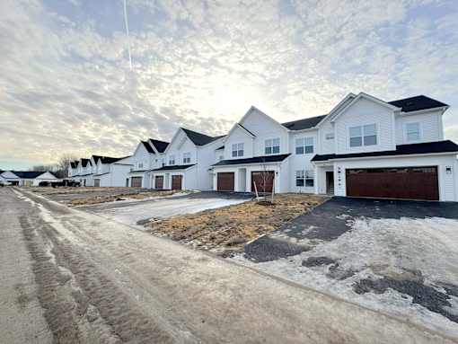 Typical view of homes with 2-car & 1-car garages during construction (winter 2025-26)