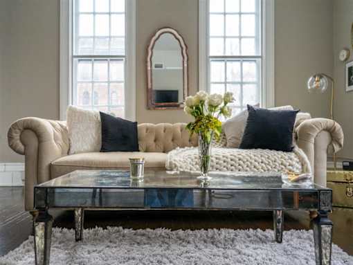 a living room with a couch and a coffee table