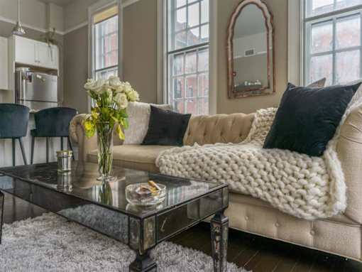 a living room with a couch and a coffee table
