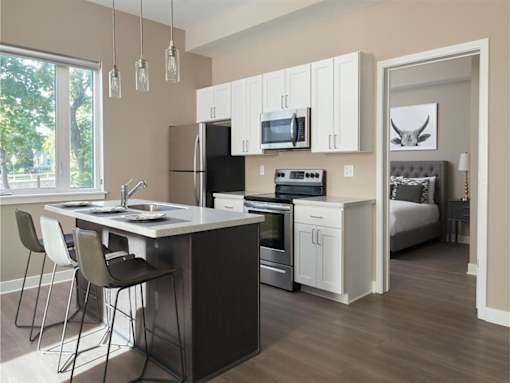a kitchen with a sink and a counter top