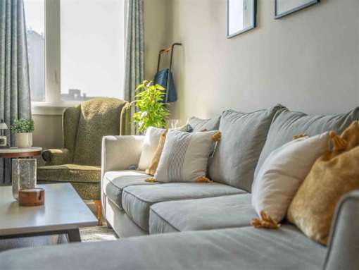a living room with a couch and a coffee table