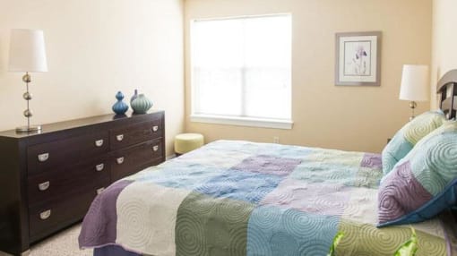 Spacious bedroom with large, bright windows Spacious bedroom with large, bright windows