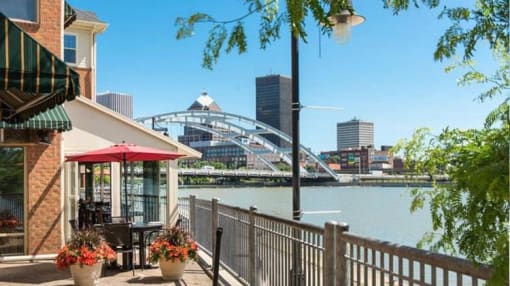 View from Leasing Office deck area towards restaurants, the Genesee River and downtown Rochester View from Leasing Office deck area towards restaurants, the Genesee River and downtown Rochester