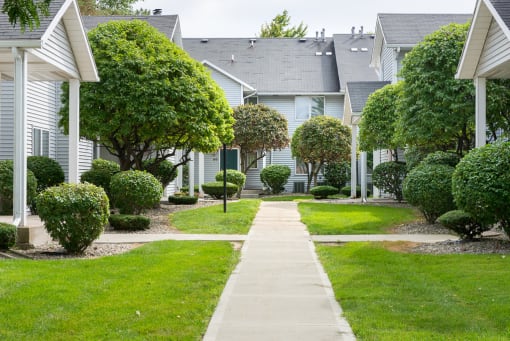 View of Village Walk neighborhood with sidewalks and landscaping