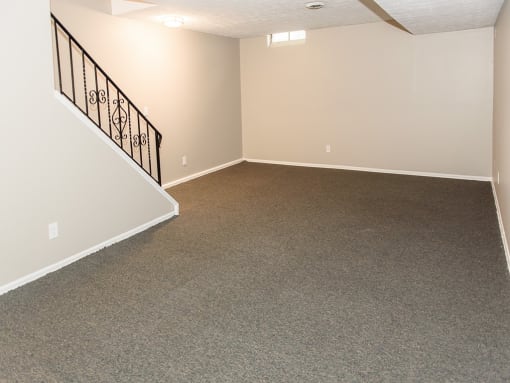 Full, finished basement to use as a second living area, playroom, storage space, in-home office, etc. Separate laundry room with hookups, too