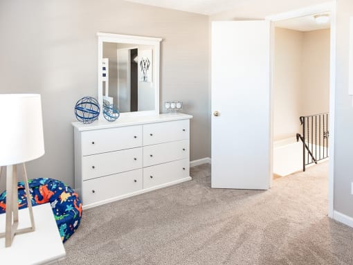 Another view of large second bedroom with wall-to-wall carpeting and closet