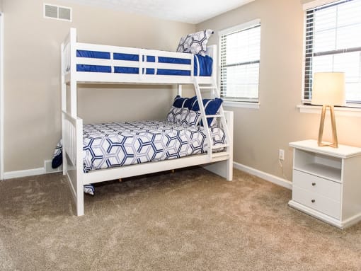 Large second bedroom with wall-to-wall carpeting and closet