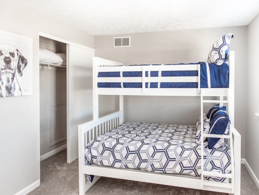 Another view of large second bedroom with wall-to-wall carpeting and closet