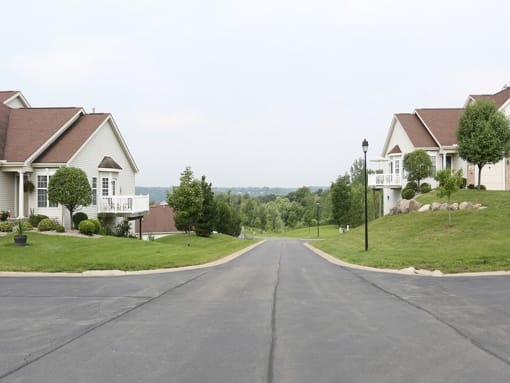 a street with houses on the side of a road