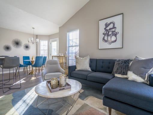 a living room with a couch and a table