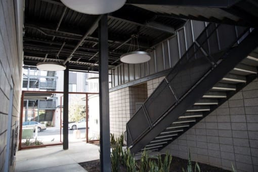 the stairs in the lobby of a building