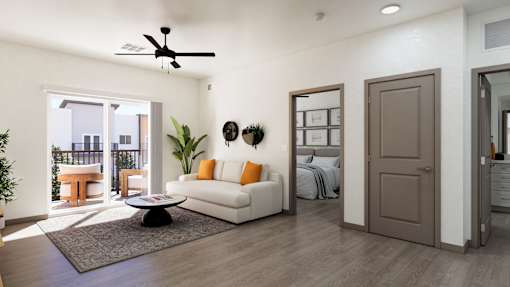 A modern living room with a white sofa and a brown door.