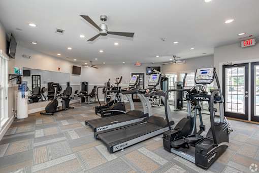 A Gym with Elliptical Machines at Mill Creek Run Apartments, Macon, 31216