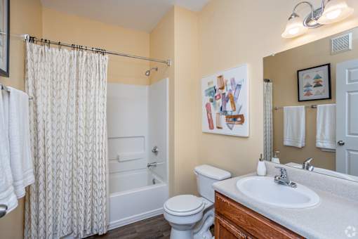Bathroom with a Toilet at Mill Creek Run Apartments, Macon, Georgia