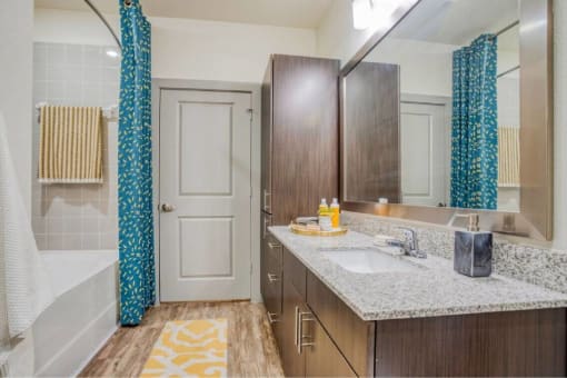 a bathroom with a sink and a mirror at The Mark, Texas