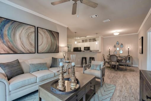 a living room with a couch and a table at Sterling Creek, Richmond Hill, GA