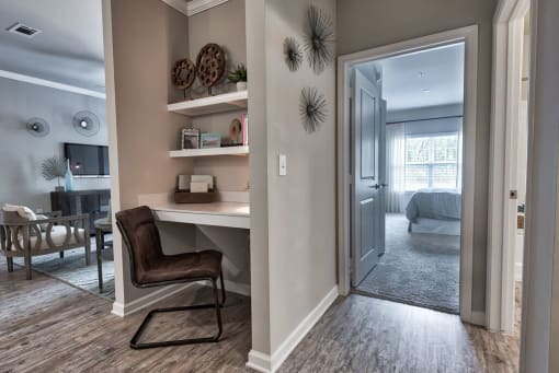 a home office with a desk and a door to a bedroom at Sterling Creek, Richmond Hill Georgia