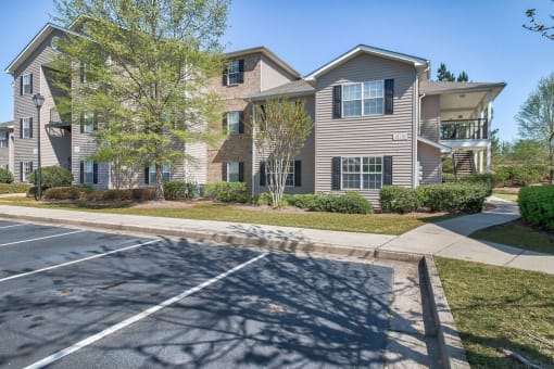 our apartments have a spacious parking lot in front of the building at Mill Creek Run, Macon Georgia