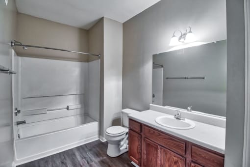 a bathroom with a sink toilet and a shower at Mill Creek Run, Macon, 31216