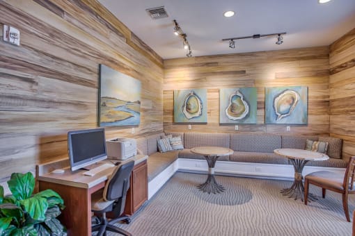 a living room with furniture and a computer on a desk at Spring Creek Apartments, Florida, 32536