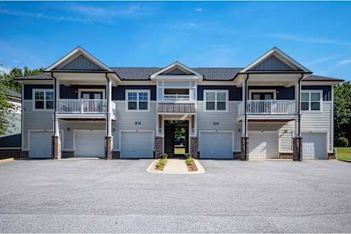 A row of houses with garages and driveways at Waterleaf at Neely Ferry Apartments, Simpsonville, South Carolina