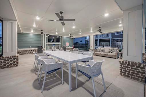 A patio with a table at Waterleaf at Neely Ferry Apartments, Simpsonville, SC