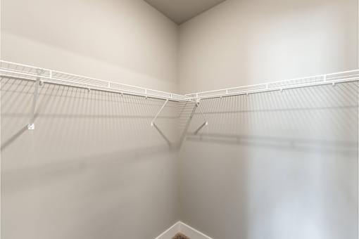 Empty white shelves at Prosper Madison Oaks, Alabama, 35758