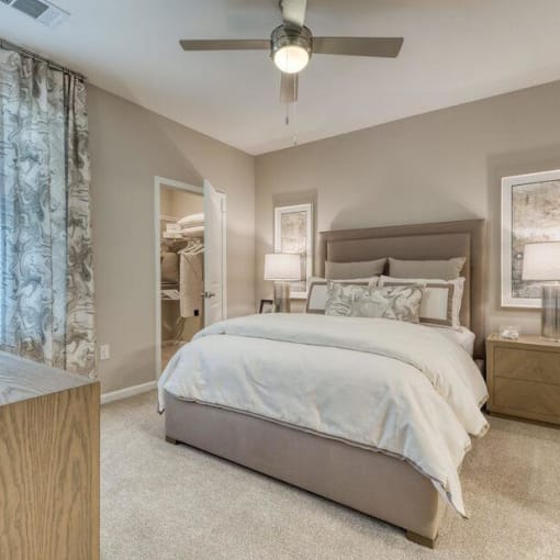 a bedroom with a bed and a ceiling fan at Citadel at Westpointe, Texas