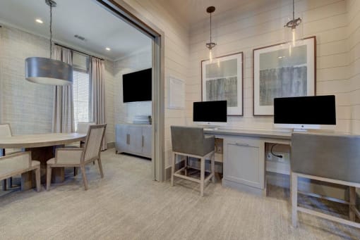 a conference room with desks and chairs and televisions at Citadel at Westpointe, San Antonio, TX