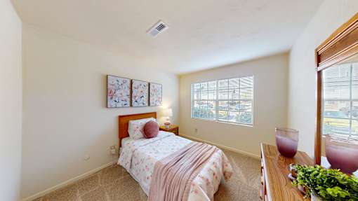 a bedroom with a large walk-in closet