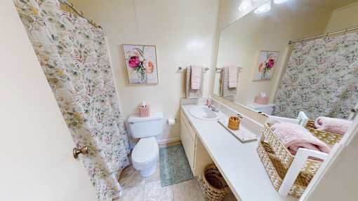 a bathroom with a built-in vanity