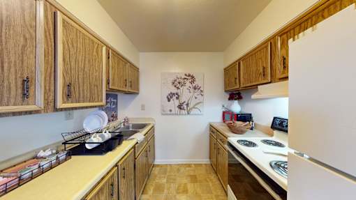 A  kitchen with a refrigerator