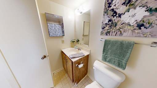 a bathroom with tiled flooring