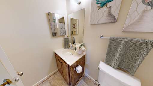 a bathroom with tiled flooring