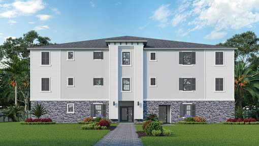 A modern building with a grey and white exterior and a stone facade.