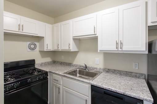 This is a photo of the kitchen in the 543 square foot B-style, 1 bedroom, 1 bath apartment at Blue Grass Manor Apartments in Erlanger, KY.